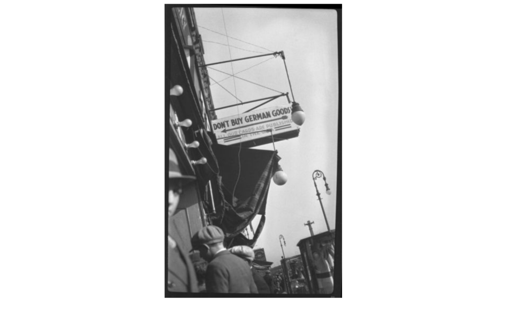 Sign states, “Don’t Buy German Goods,” at 154 Delancey Street, New York, 1933, Graduate School for Jewish Social Work Records (I-7)